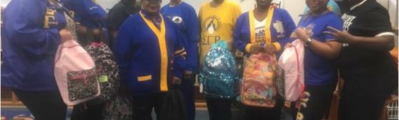 Sorority Distributes Book Bags & Supplies to STBCS